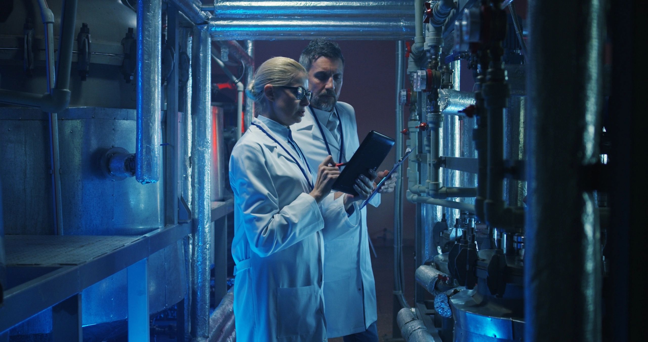Scientists conducting technical checks in a laboratory