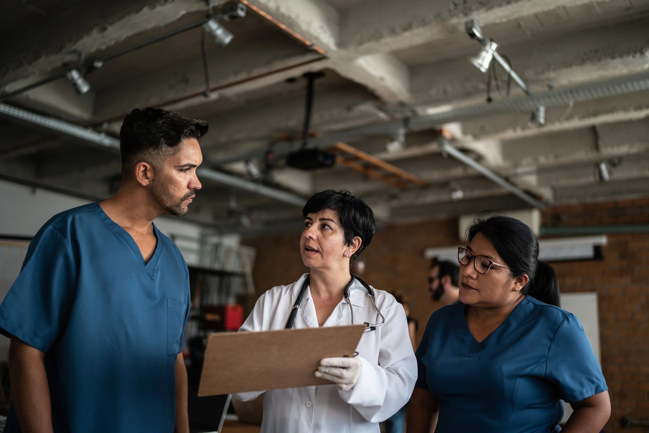 Public health professionals collaborating in a clinical setting
