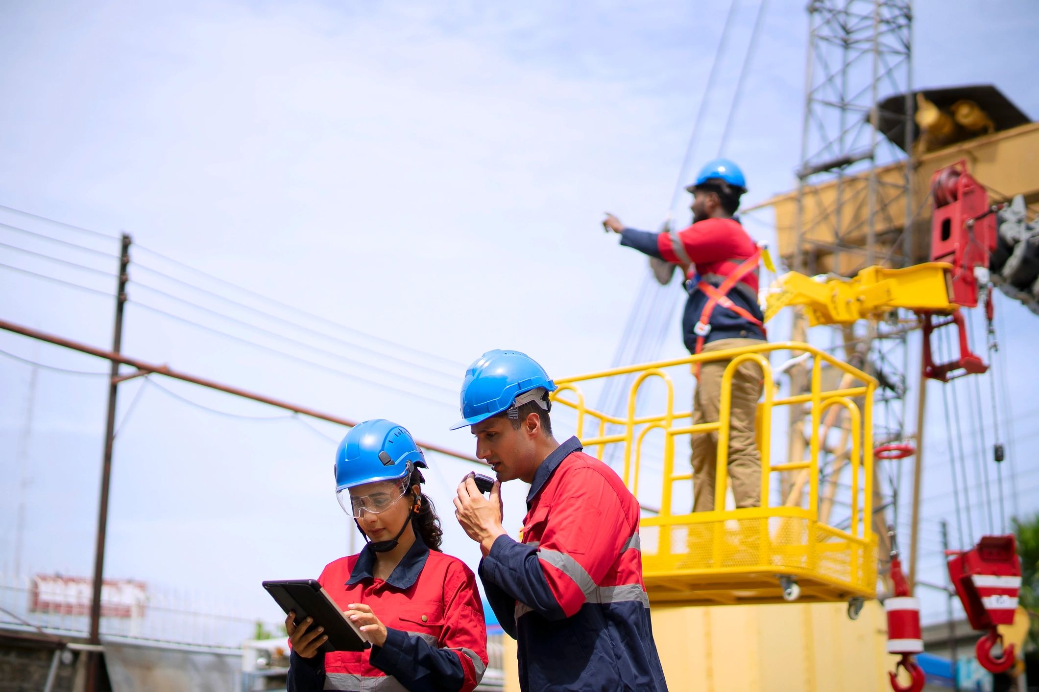 Engineers reviewing plans at an infrastructure worksite