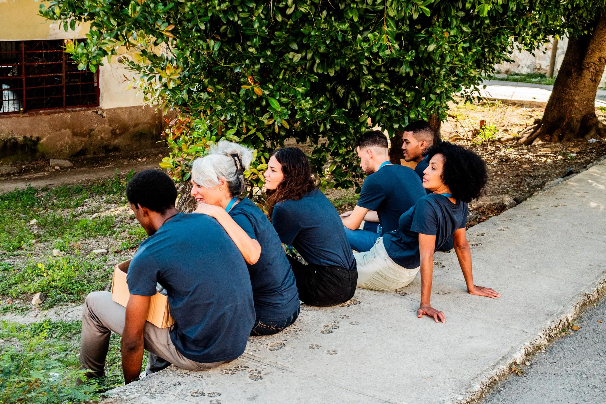 Humanitarian volunteers coordinating outdoors