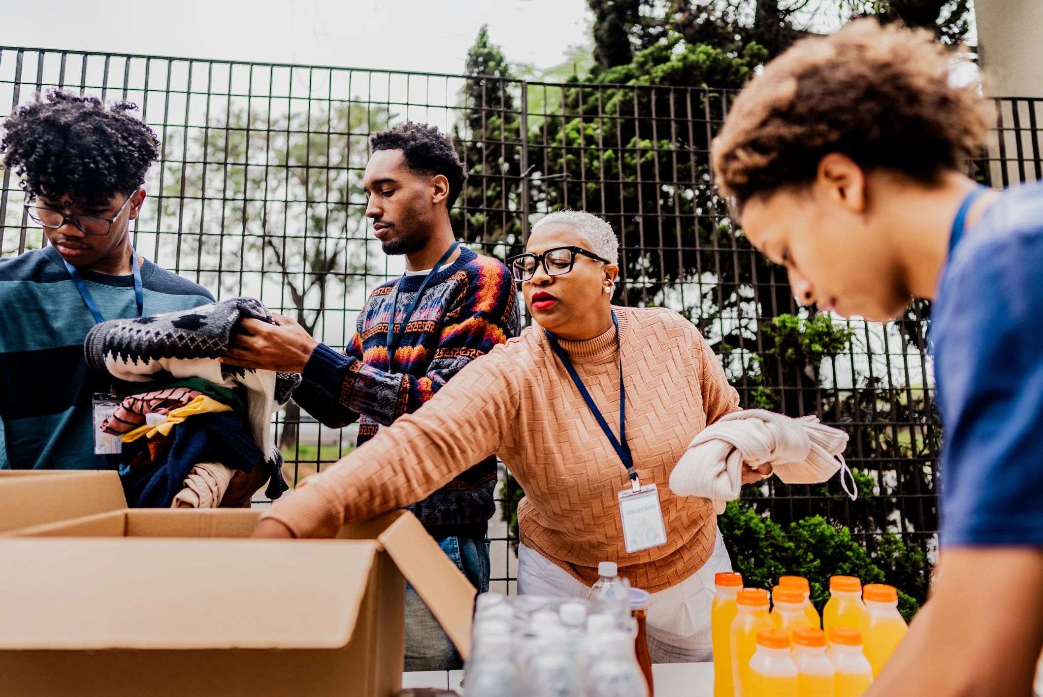 Volunteers sorting aid supplies during a coordinated humanitarian field response