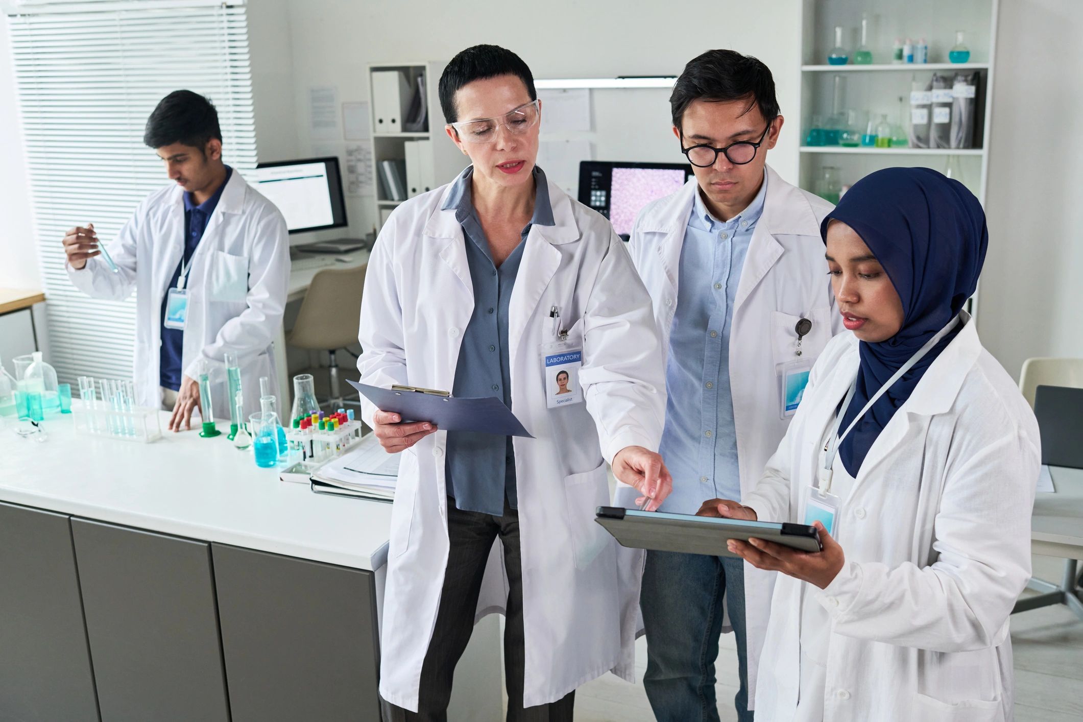 Scientists reviewing research data in a medical laboratory